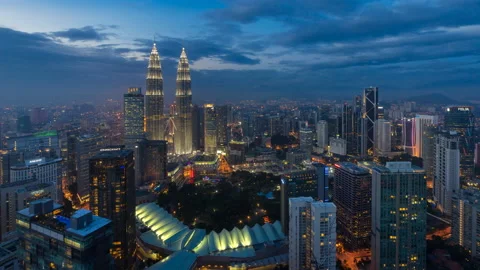 Time lapse: High angle cityscape view during dusk overlooking the Kuala Lumpur Stock Footage 225730855