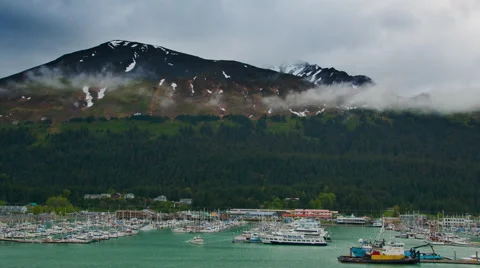 Time lapse high angle view of traveling clouds hovering above the Ketchikan boat Stock Footage 52218200