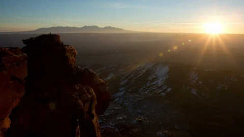 Time lapse high angle view of the sunrise over a snowy Canyonlands National Park Stock Footage 116153161