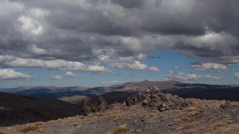 Time lapse high angle view of approaching clouds over the Bodie Hills Stock Footage 116925361
