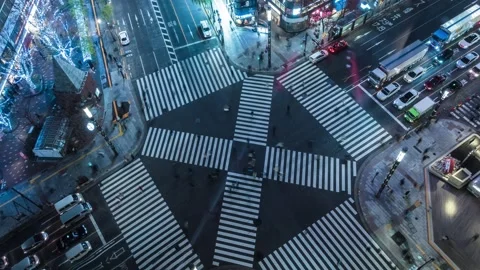 Time Lapse high-angle view of zebra crossing in Ginza district at night, Tokyo Stock Footage 145504393