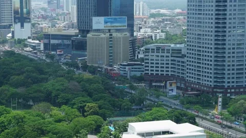 Time lapse high angle view at Lumpini Park and Rama IV road at Bangkok Stock Footage 284238274