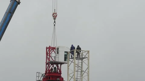 Time-lapse of high-rise crane assembly process Stock Footage 153923554