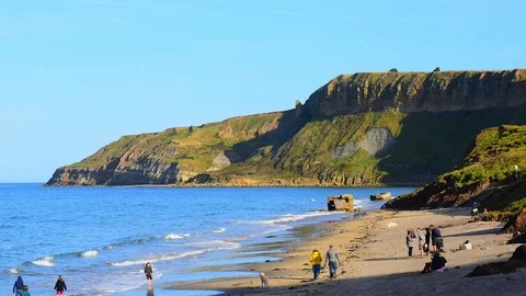 Time lapse high tide at cayton bay scarborough yorkshire uk Stock Footage 116173144