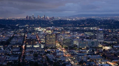 Time lapse high view of downtown Los Angeles and Glendale on a stormy evening Stock Footage 126795355