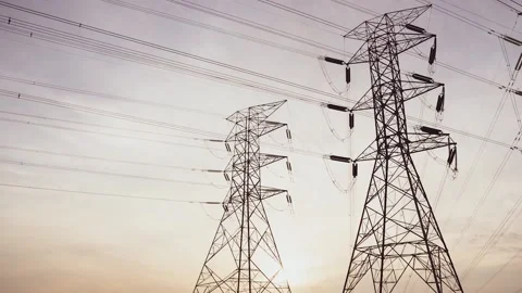 Time lapse of High voltage electric towers at sunset. Transmission power line Stock Footage 163265179