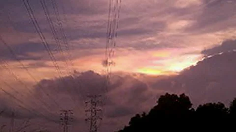 Time-lapse of high voltage line in sunset. Stock Footage 33844235