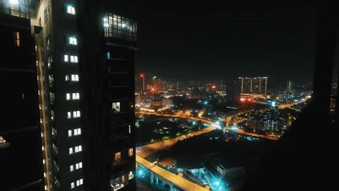 Time-lapse of the highway below the skyscraper in Kuala Lumpur. Night in the Stock Footage 341176203