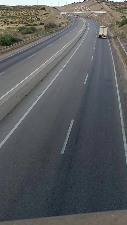 Time-lapse of Highway Traffic in Morocco with Scenic Overpass Bridge Stock-Footage 335081784