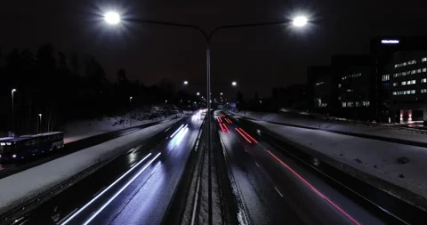 Time-lapse of the highway traffic in the winter night Stock Footage 147997164