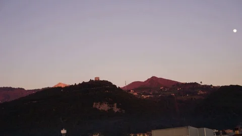 Time lapse of a hill with a castle at sunset Stock Footage 124013847