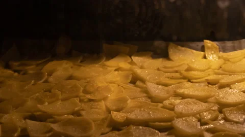 Time lapse home made potato chips in oven Stock Footage 144255178