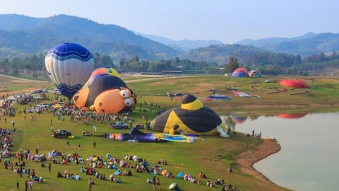Time Lapse Hot Air Balloons And Many Peoples Around in Singha Park,Thailalnd Stock Footage 85853689