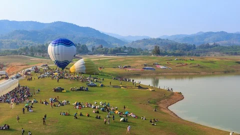 Time Lapse Hot Air Balloons And Many Peoples Around in Singha Park,Thailalnd Stock Footage 85854472