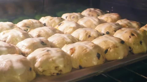 Time lapse of hot cross buns rising in oven 4K Stock Footage 48846323