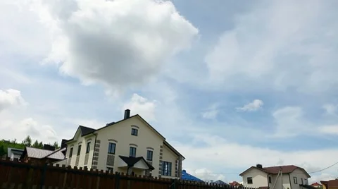 Time lapse. house with passing clouds Stock Footage 8565093
