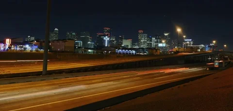 Time lapse of Houston freeway with Downtown in the background Stock Footage 72369145