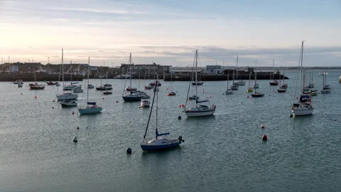 Time Lapse of the Howth port outside Dublin, Ireland, Sailboats float on water Stock Footage 320234231
