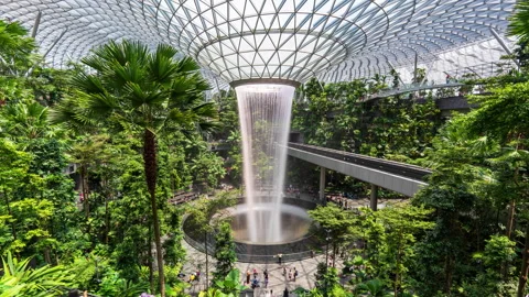 Time-lapse HSBC Rain Vortex Indoor waterfall, Changi International Airport natur Stock Footage 249615583