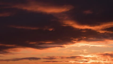 Time lapse of huge fluffy orange purple clouds fast moving on sunset sky 스톡 동영상 270070700