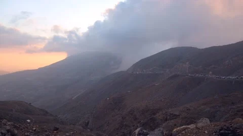 Time lapse of huge mystical clouds moving during sunset captured from Jebel Jais Stock Footage 146152344