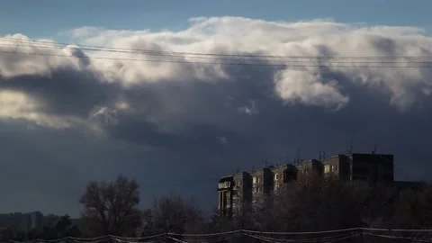 Time lapse: hurricane clouds float above residential buildings Stock Footage 141406668