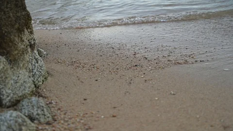 Time lapse hyper lapse panning waves on the beach sunset Stock Footage 128656848