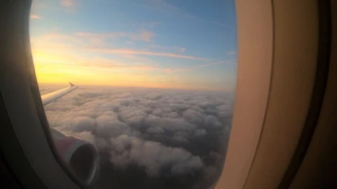 Time lapse hyperlapse point of view from window airplane flying above and clouds Stock Footage 105724420