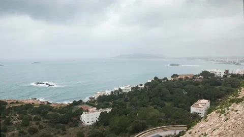 Time-lapse on the ibiza coastline in Eivissa, dramatic rain clouds rolling in Video stock 175867705
