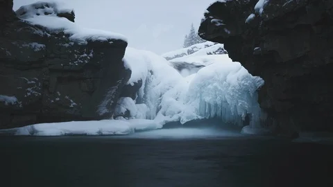 Time lapse of ice covered waterfall during winter Stock Footage 86952359
