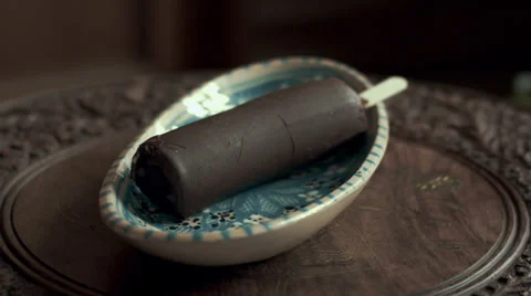 Time-lapse of ice-cream melting, Eskimo pie Stock Footage 34685081