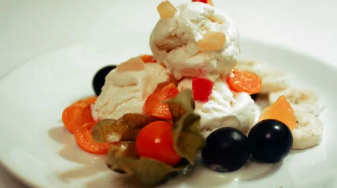 Time-lapse of ice-cream melting, with fresh fruits Stock Footage 35182535