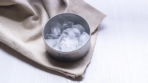 Time Lapse Of Ice Cube To Water.HD Stock Footage 127209036