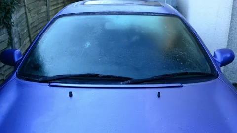 Time lapse ice forming on car windscreen united kingdom Stock Footage 152451229