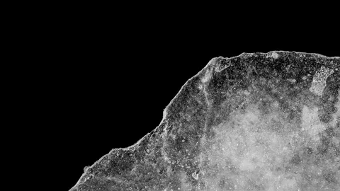 Time lapse ice melting high contrast 30fps alpha Stock Footage 82382973