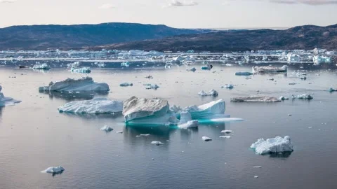 Time-lapse of icebergs drifting in large Sermilik fjord of East Greenland Video stock 332381384
