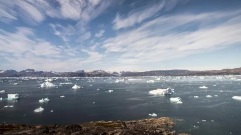 Time-lapse of icebergs drifting in large Sermilik fjord of East Greenland Stock Footage 332392218