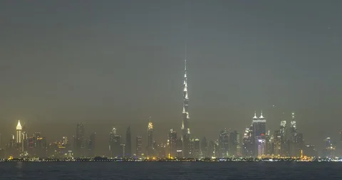 Time lapse of the iconic downtown Dubai skyline and Burj Khalifa from the palm Stock Footage 127028334