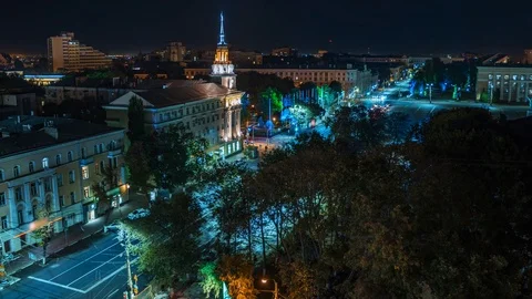 Time-lapse of illuminated road intersection in Voronezh city downtown with car Stock Footage 115056447