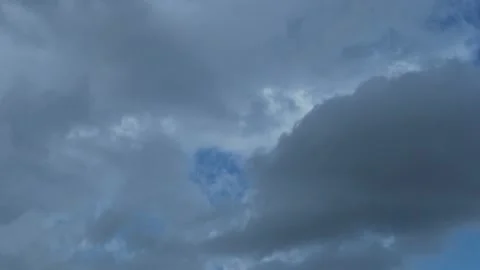 A Time Lapse of Impending Transforming Gray Storm Clouds in a Blue Sky in Rainy  Stock Footage 150496675