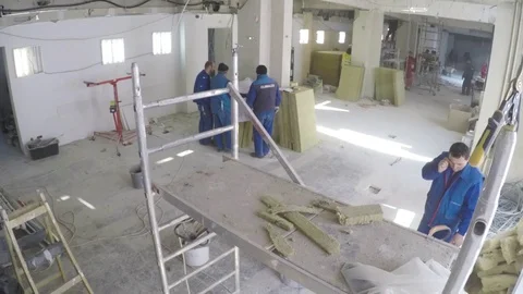 Time lapse of interior construction workers. Renovation day to night Stock Footage 111945459