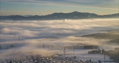 Time lapse of inversion clouds moving in large basin Stock Footage 167732639