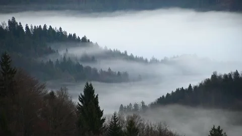 Time lapse of inversion clouds moving in the valley Stock Footage 173011361