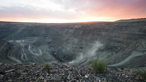 Time lapse. Iron ore quarry at dawn. Sky. Sun. Moving clouds Stock Footage 63767430