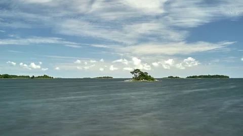 Time lapse of an island at Swedens east coast with clouds passing by in 4K Stock Footage