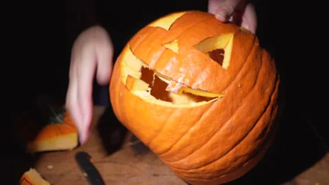 Time lapse jack o lantern being carved Stock Footage 141547357