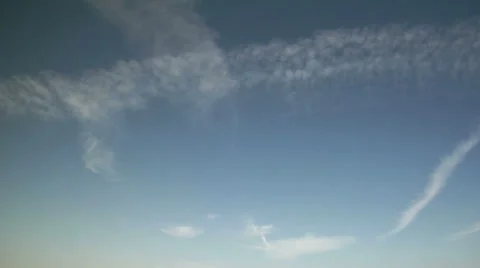 Time Lapse of Jet Contrails Spreading into Cirrus Clouds Stock Footage 54731711
