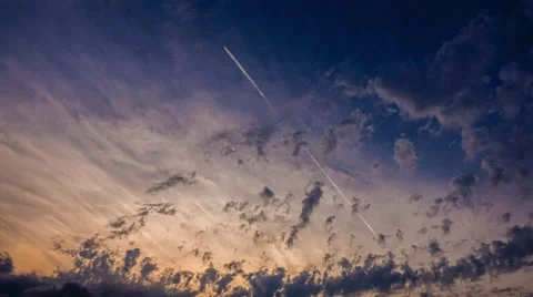 Time Lapse Of Jet Trails Through Sunset With Clouds Stock Footage 65000884