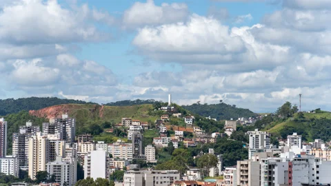 Time-lapse of Juiz de Fora cityscape with white tower and skyscrapers Stock Footage 237543941