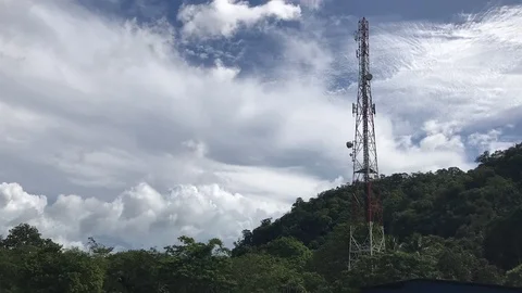 Time lapse Jungle forest &amp; Signal transmitting tower Stock Footage 96692829